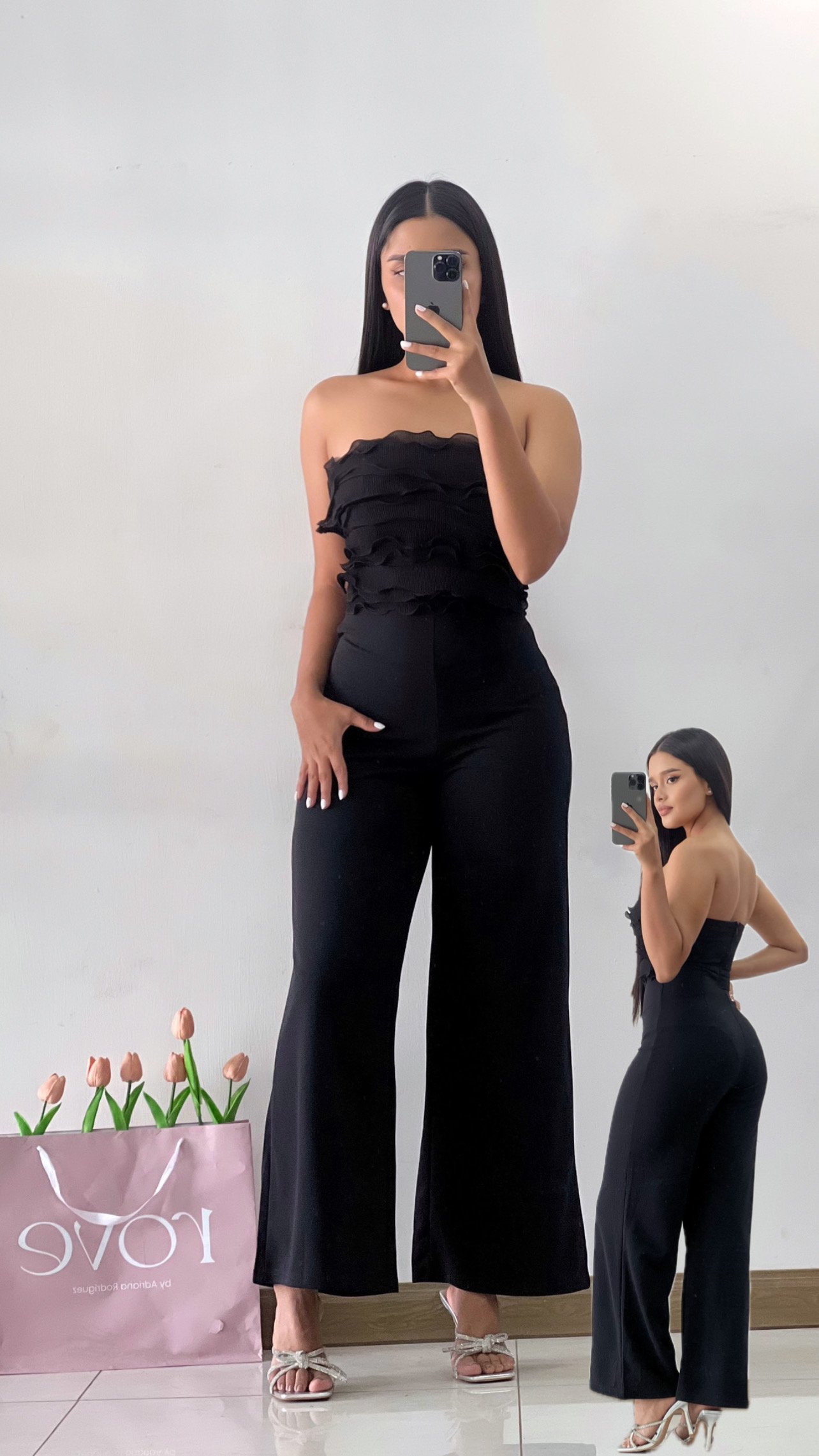 Jumpsuit strapless con vuelos frontales Negro